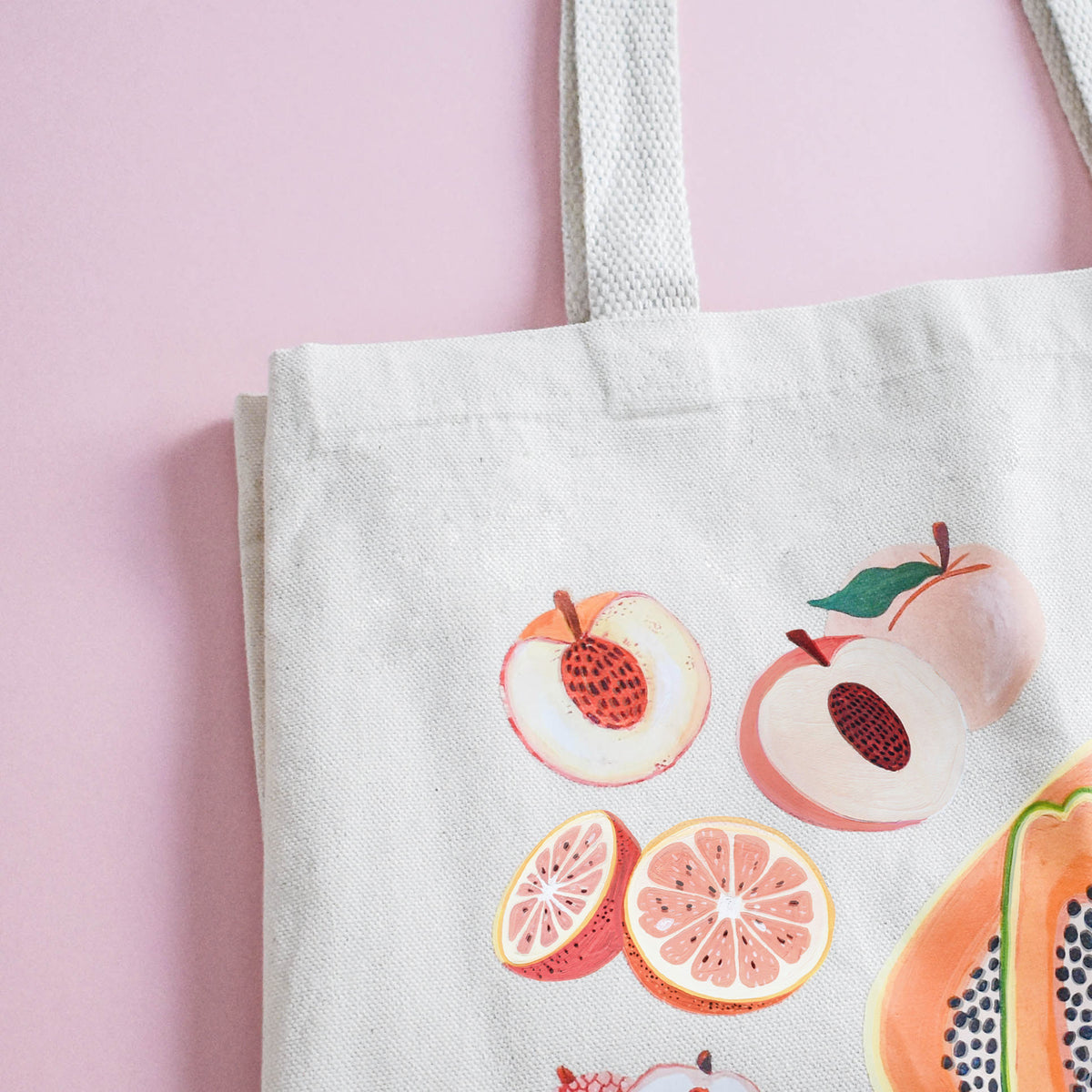 Bags on sale and fruits